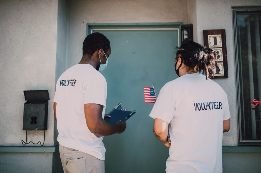 Volunteers loading donation boxes for community service